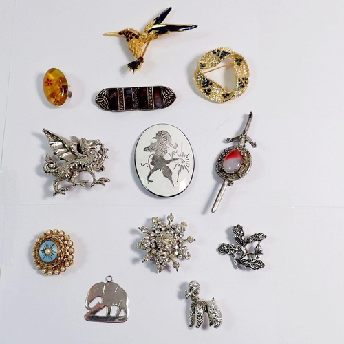 345 - A group of various brooches including four silver brooches, a plated dragon brooch and a kingfisher