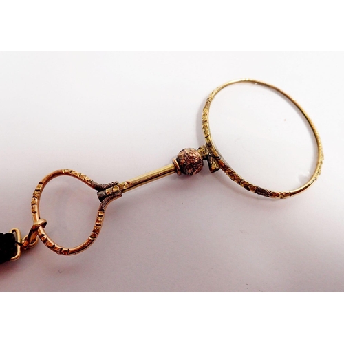 350 - A Victorian gold plated monocole or magnifying glass