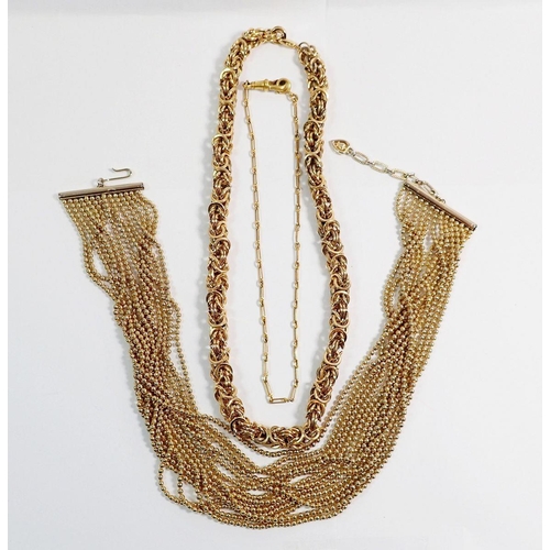 357 - A gold plated multi strand necklace and two gold plated necklaces