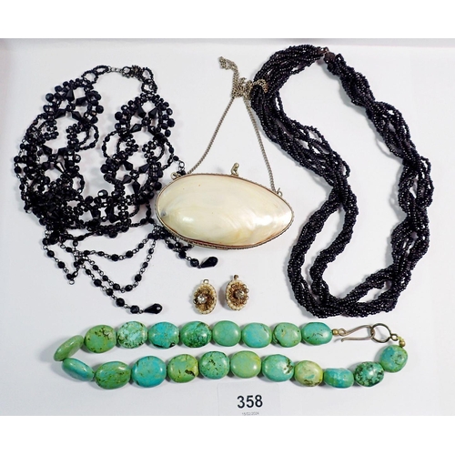 358 - A turquoise matrix bead necklace, two black bead necklaces and shell purse