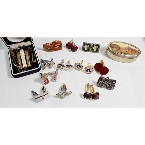 362 - A box of cufflinks, tie pins etc plus a slide rule novelty money clip etc.