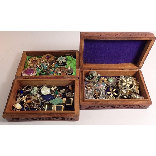 382 - Two wooden boxes of various costume jewellery including necklaces, brooches, rings etc.