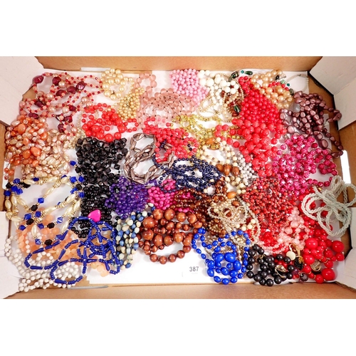 387 - A box of costume beaded necklaces