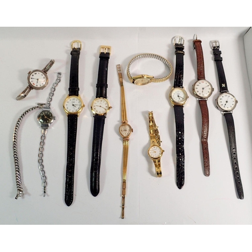 407 - Three silver 1930's wrist watches, one with silver strap and various other ladies wrist watches incl... 