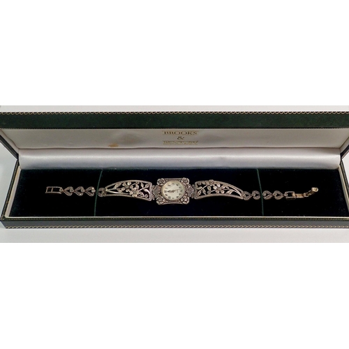 409 - A Brooks & Bentley silver marcasite bracelet watch