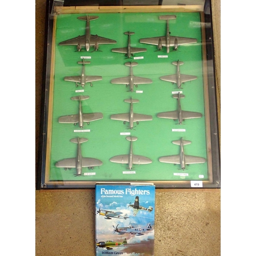 419 - A complete set of twelve Danbury Mint pewter WWII fighter planes in homemade display case, 72 x 63cm... 