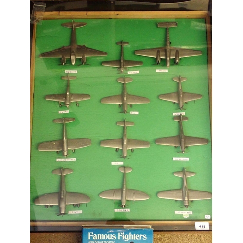 419 - A complete set of twelve Danbury Mint pewter WWII fighter planes in homemade display case, 72 x 63cm... 