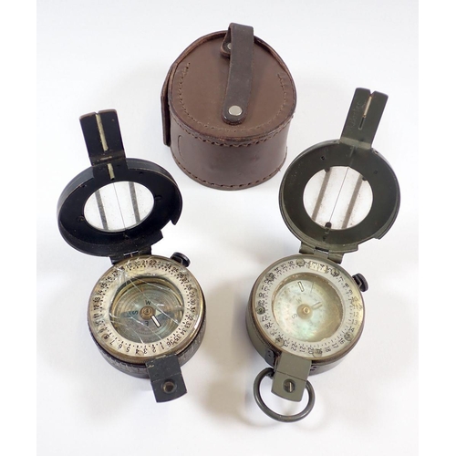 422 - Two military WWII compasses - one by Stanley with mother of pearl dial and one with broadarrow mark ... 