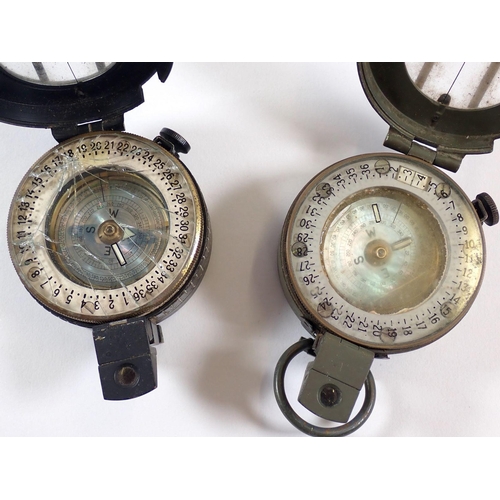 422 - Two military WWII compasses - one by Stanley with mother of pearl dial and one with broadarrow mark ... 