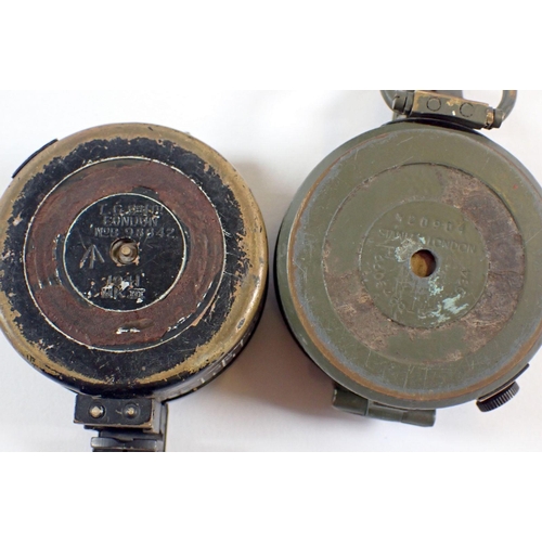 422 - Two military WWII compasses - one by Stanley with mother of pearl dial and one with broadarrow mark ... 