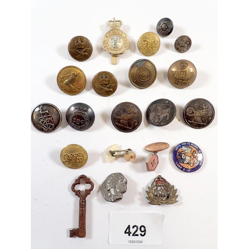 429 - A box of military buttons, badges etc.