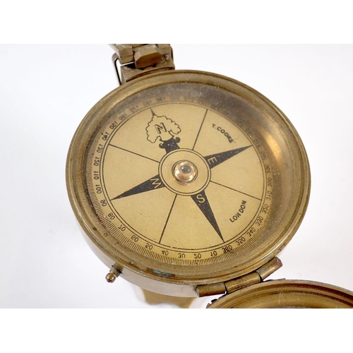 432 - A brass pedestal compass by Stanley