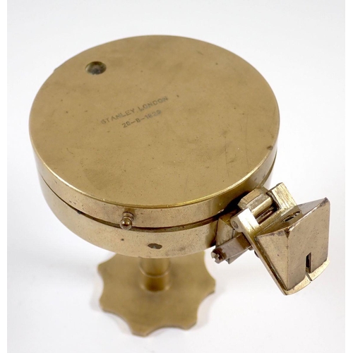 432 - A brass pedestal compass by Stanley