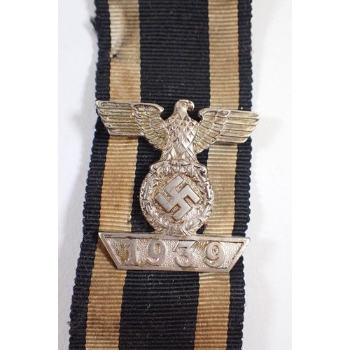 445 - A German Third Reich Bar to the Iron Cross with ribbon