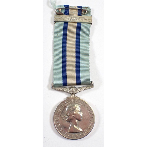 446 - An Elizabeth II Royal Observer Corps medal awarded to Observer C King