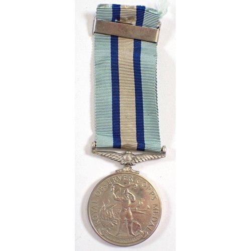 446 - An Elizabeth II Royal Observer Corps medal awarded to Observer C King