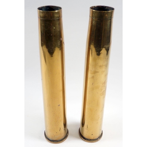 448 - A pair of brass shell case vases, 31cm