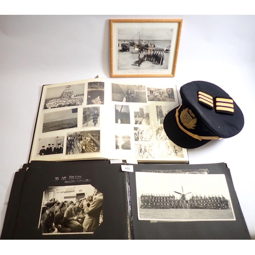 458 - Two photograph albums containing over 250 black and white photos and ephemera relating to D Wellard ... 