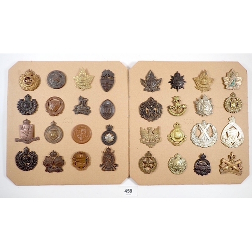 459 - A carded display of 32 Canadian military cap badges including many officers training colleges etc, 3... 