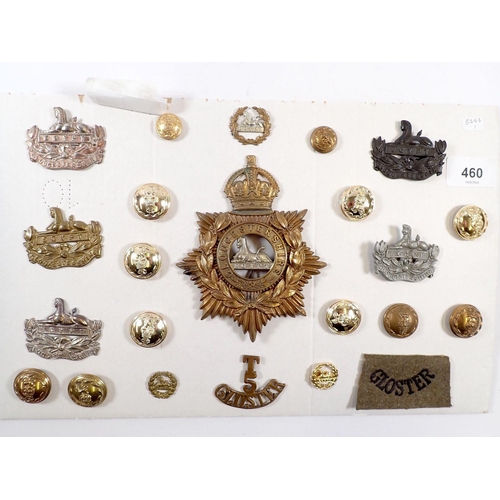 460 - A collection of military insignia to the Gloucestershire Regiment, other ranks helmet plate, officer... 