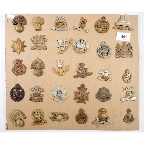 461 - A display of 30 British military cap badges, Lancashire Fusiliers, Staffordshire, Lincolnshire, Lond... 