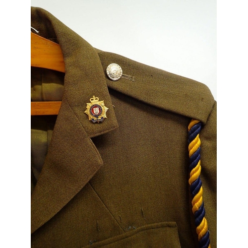 500 - An officers army jacket with Royal Logistics buttons, collar badges etc. by Moss Bros