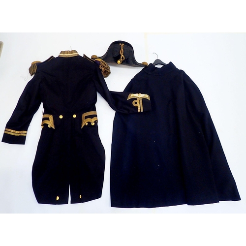 502 - A 19th century Naval officers uniform including bicorn hat, dress coat with epaulettes and a cape