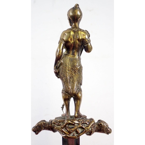 509 - An unusual decorative brass dagger on theme of The Last of the Mohicans with Mohican warrior figure ... 