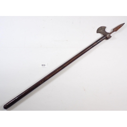 513 - A 19th century mahogany handled fighting axe with metal blade and spear top, 70cm