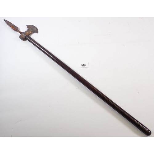 513 - A 19th century mahogany handled fighting axe with metal blade and spear top, 70cm