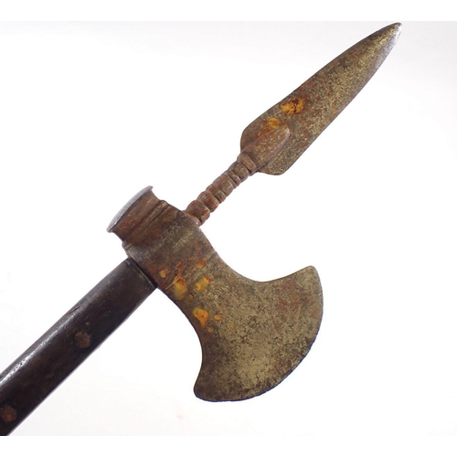 513 - A 19th century mahogany handled fighting axe with metal blade and spear top, 70cm