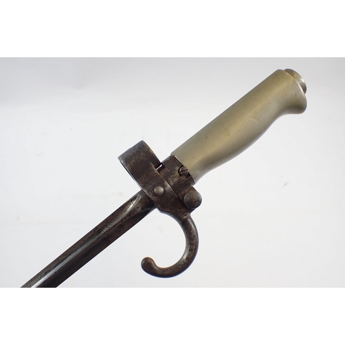 515 - A French Mle 1886 bayonet and scabbard, blade 52cm