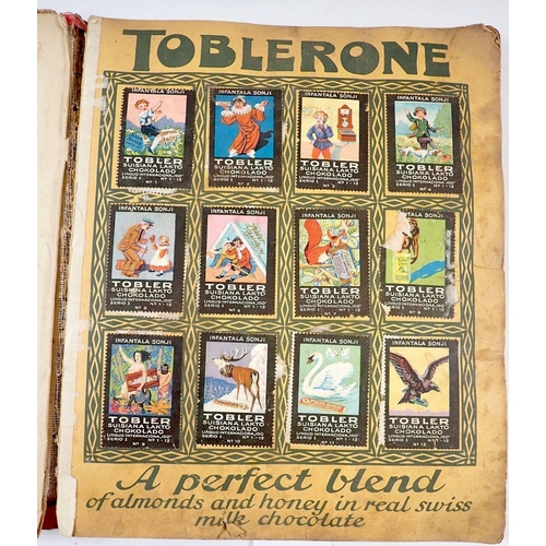 590 - A Swiss album of Tobler and Toblerone chromolithograph chocolate trade cards in original album