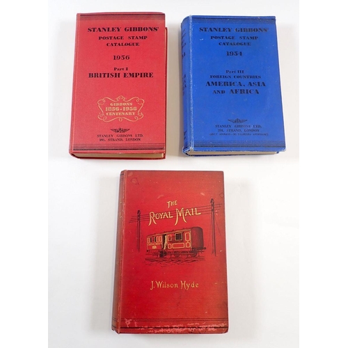 609 - The Royal Mail by J Wilson Hyde together with two Stanley Gibbons catalogues, 1954-1956