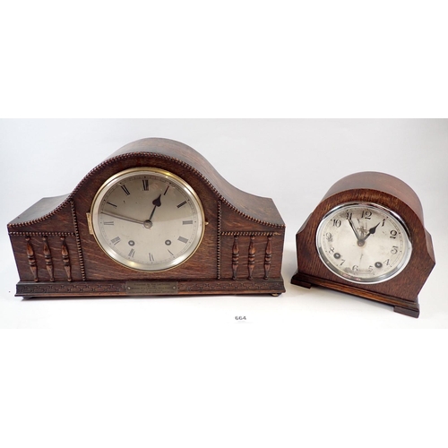 664 - An oak cased Garrard striking mantel clock, 18cm tall and another larger oak mantel clock