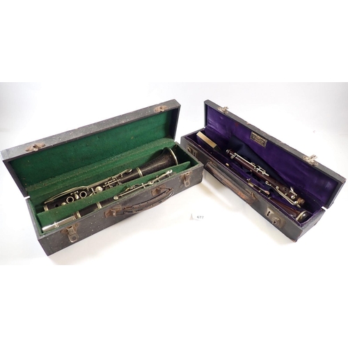 677 - An antique rosewood oboe stamped 'JTL' and a student clarinet - both cased