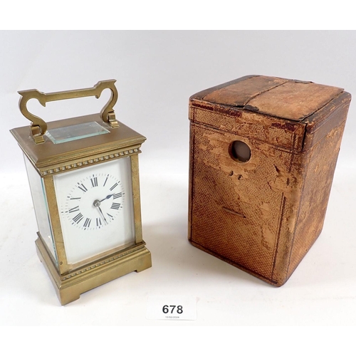 678 - A 19th century French brass carriage clock with travelling case and key, 12.5cm