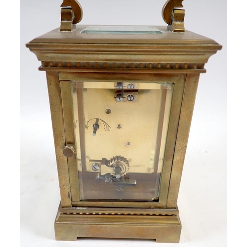 678 - A 19th century French brass carriage clock with travelling case and key, 12.5cm