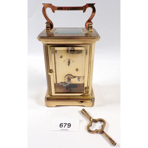 679 - A Charles Frodsham brass carriage clock with key, 11cm tall