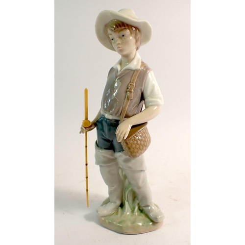 68 - A Lladro figure of a fisherman with rod, 21cm tall