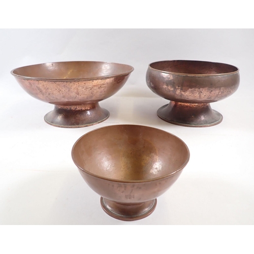 681 - Three various copper bowls, largest 23cm diameter