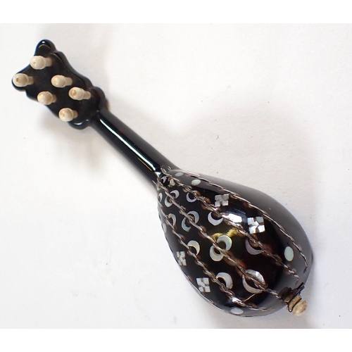 682 - A miniature tortoiseshell and mother of pearl miniature mandolin with bird and flower inlay and bone... 