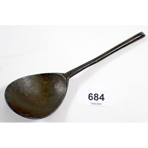 684 - A mid 17th century latten spoon with slip top and impressed mark to bowl, 16.5cm