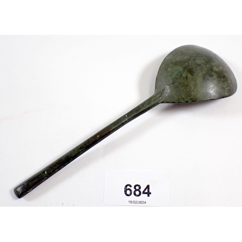 684 - A mid 17th century latten spoon with slip top and impressed mark to bowl, 16.5cm