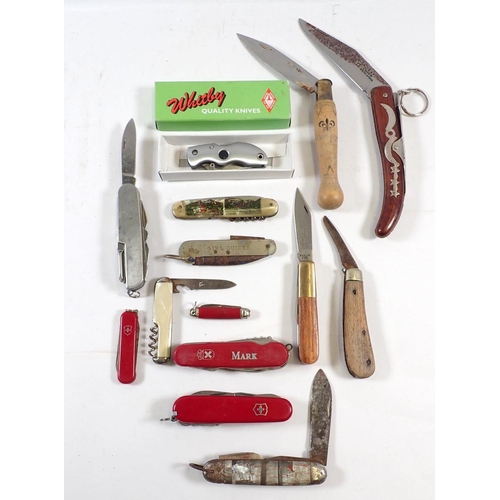 685 - A box of various penknives including Nontron, Okapi, Whitby, Rostfrei Solingen, Swiss etc.