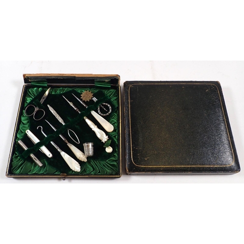 689 - A Victorian mother of pearl needlework and manicure set - cased