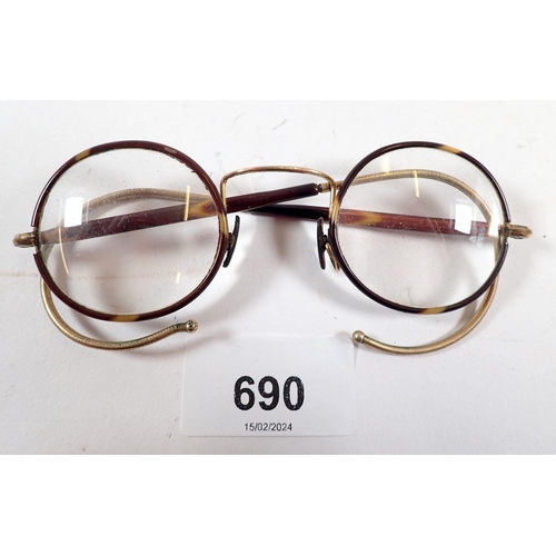 690 - A pair of tortoiseshell and gilt metal spectacles, cased