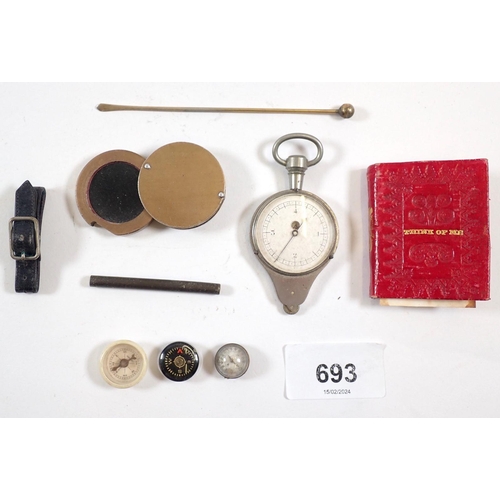 693 - A box of collectables including three miniature compasses, gemological eye glass, mapping tool and m... 