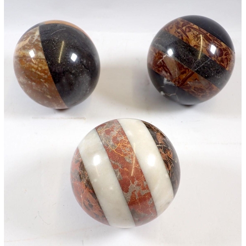 713 - Three carved marble specimen balls