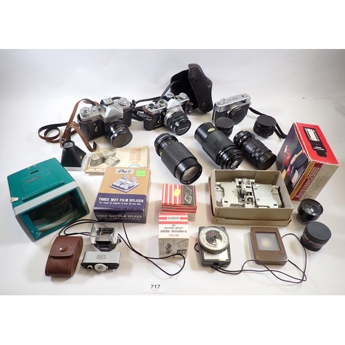 717 - A box of camera equipment including OMI with 50mm lens, etc.